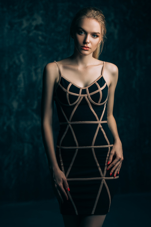 Amazing woman wearing elegant fitting dress. Beauty, fashion concept. Evening dresses collection.の写真素材