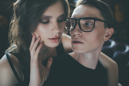 Portrait of an attractive young people in love at home. Beauty, fashion.の写真素材