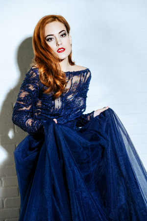 A beautiful lady in an evening dress. Fashion, beauty.の写真素材