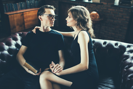Portrait of an attractive young people in love at home. Beauty, fashion.の写真素材