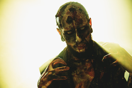 Close-up of a creepy scary zombie. Halloween. Horror film.の写真素材