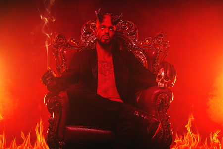 A portrait of a bad demon in his throne. Horror movie, nightmare. Halloween.の写真素材