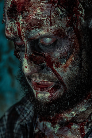 Close-up of a creepy scary zombie. Halloween. Horror film.の写真素材