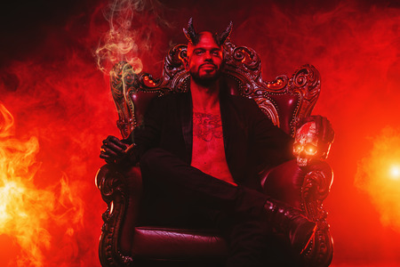 A portrait of a bad demon in his throne. Horror movie, nightmare. Halloween.の写真素材