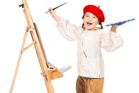 A portrait of a positive girl painting a picture. Creativity, artist.の写真素材