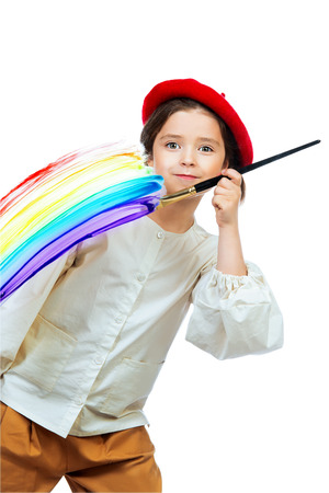 A portrait of a positive girl painting a picture. Creativity, artist.の写真素材