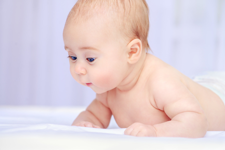 Portrait of a sweet three-month-old baby. Baby care, Healthcare.の写真素材