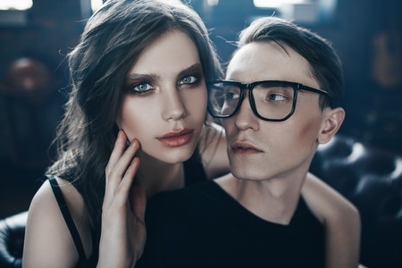 Portrait of an attractive young people in love at home. Beauty, fashion.の写真素材