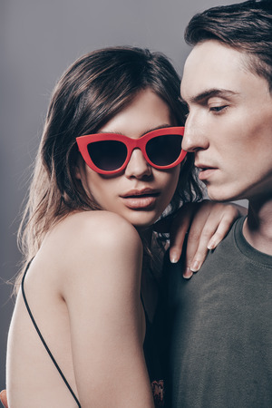 Close-up portrait of an attractive young people in love. Beauty, fashion. Optics style.の写真素材