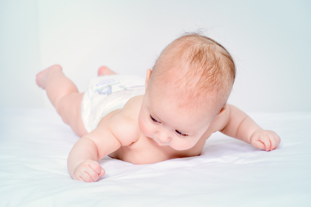 Portrait of a sweet three-month-old baby. Baby care, Healthcare.の写真素材