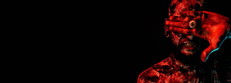 Close-up of a creepy scary zombie. Halloween. Horror film.の写真素材