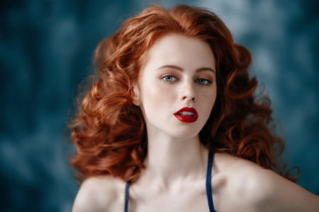 A portrait of a gorgeous beautiful young woman posing in the studio. Beauty, cosmetics.の写真素材