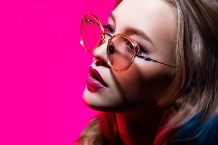 A close up portrait of an elegant lady wearing glasses. Beauty, make-up, style.の写真素材