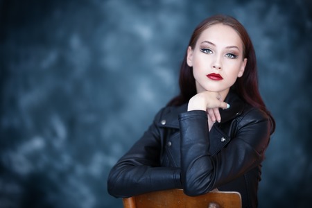 A portrait of a beautiful young woman. Beauty, cosmetics, evening makeup.の写真素材