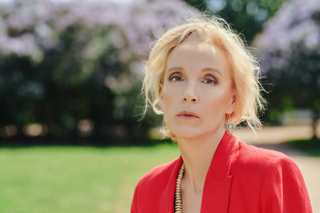 A portrait of an elderly stylish woman in the summer park, Beauty, fashion.の写真素材