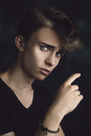 A portrait of a young goodlooking guy. Beauty of men.の写真素材