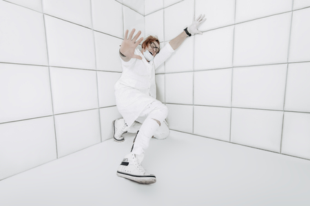 Portrait of a  scared crazy doctor in a psychiatric hospital.の写真素材