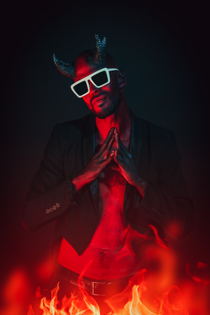 A portrait of a bad demon in sunglasses. Horror movie, nightmare. Halloween.の写真素材