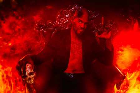 A portrait of a bad demon in his throne. Horror movie, nightmare. Halloween.