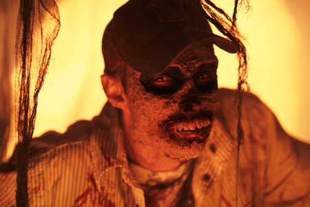 Portrait of a horrible scary zombie man. Horror. Halloween.の写真素材