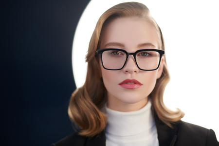 Modern business woman in formal clothes and spectacles. Beauty, fashion. Optics and eyewear style.の写真素材