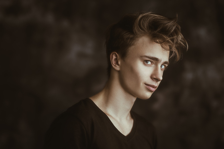 A portrait of a young goodlooking guy. Beauty of men.の写真素材