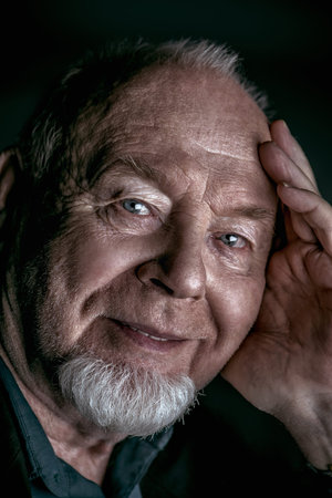Close-up portrait of an elderly man. Older generation.