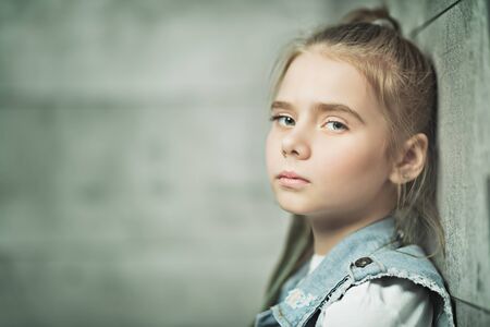 A close up portrait of a young beautiful girl in the studio. Beauty, fashion.の写真素材