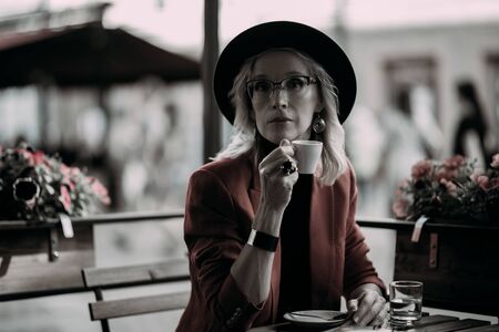 A portrait of an elegant elderly woman at the cafe. Beauty, fashion.の写真素材