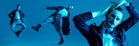 Art and fashion. Male mime artist. A young man with makeup in the style of the 20s in an elegant suit plays different life roles. Studio portrait.の写真素材