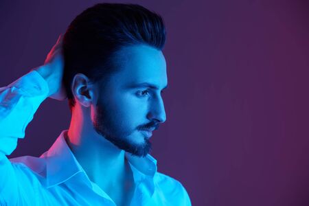 Portrait of a handsome man looking away thoughtfully. Business concept. Copy space.の写真素材