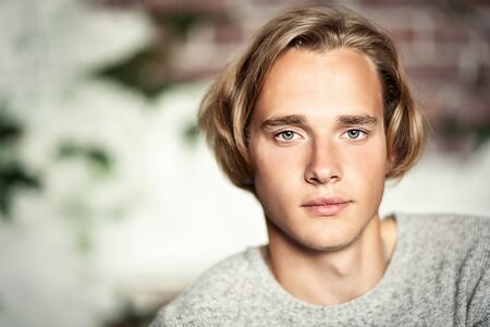 A portrait of a young goodlooking man. Casual men fashion.の写真素材