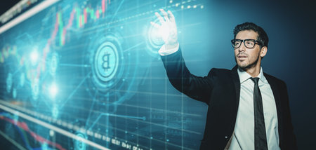 A close up portrait of  business man on background with charts with bitcoins.Business concept.