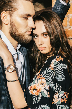 Close-up portrait of a beautiful young people in love in the city. Summer fashion.の写真素材