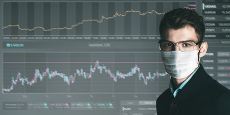COVID-19 and business. Portrait of a businessman in a medical mask on a background of coronavirus...