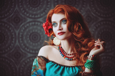 Portrait of a beautiful red-haired gypsy woman. National gypsy costume, ethnic. Make-up and...