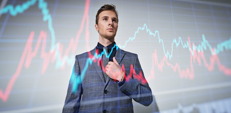 Men's fashion. Portrait of a handsome young businessman in a formal suit and glasses in red light....
