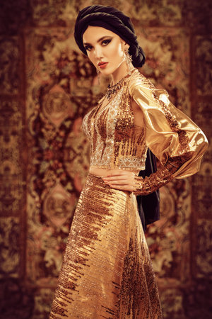 Oriental beauty woman. Portrait of a beautiful arabian woman in traditional dress, with traditional...