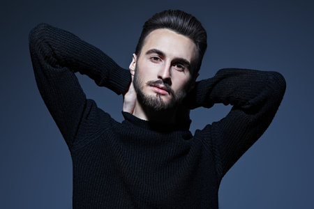 Portrait of a handsome young man. Men's beauty. Studio shot.