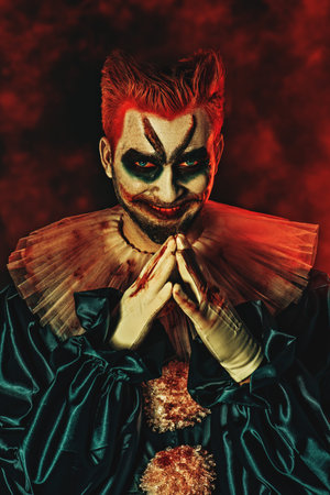 A portrait of an angry crazy clown from a horror film. Halloween, carnival.