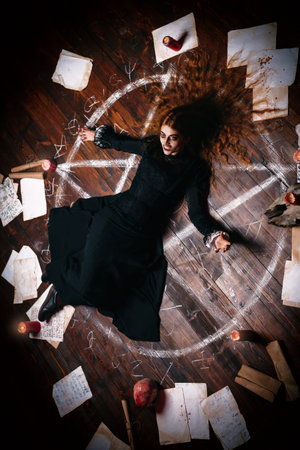 A portrait of a scary witch in the wooden house. Magic, dark force, spell.