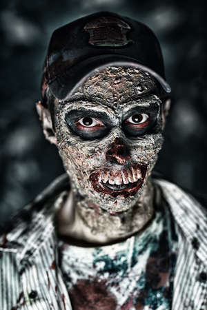Portrait of a horrible scary zombie man. Horror. Halloween.の写真素材