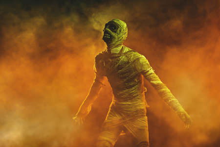 Ancient Egyptian mythology. Sinister mummy with black eyes, surrounded by mysterious smoke. Halloween.の写真素材