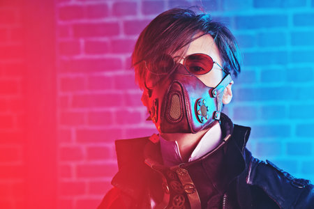 World of steampunk. Portrait of a courageous dieselpunk man on a brickwall background.の写真素材