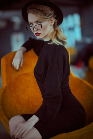 Beautiful girl with elegant romantic appearance in natural light. Beauty, fashion. Optics and eyewear.の写真素材