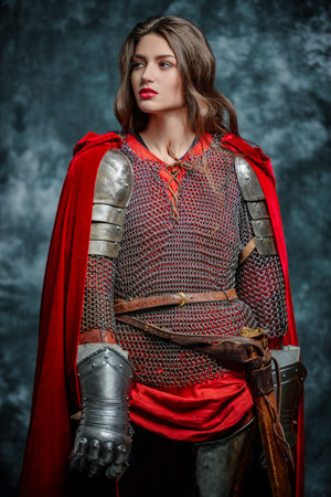 Portrait of a beautiful female knight in armor of noble birth. History of the Middle Ages.の写真素材
