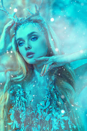 Enchanting forest nymph in a magical forest. Fantasy world.の写真素材