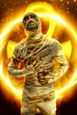 Sinister mummy surrounded by flames. Halloween. Ancient Egyptian mythology.の写真素材