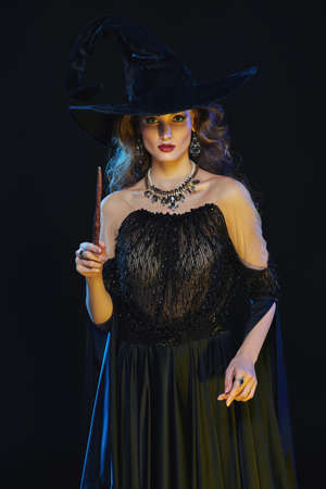 Gorgeous sexy woman lies on expensive silver fox fur coats. Fur coat fashion. Luxurious lifestyle.の写真素材