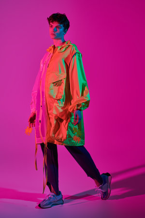 Art fashion shot. Portrait of a handsome young male model posing at the studio in creative designer...